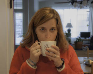 Sarah drinking coffee