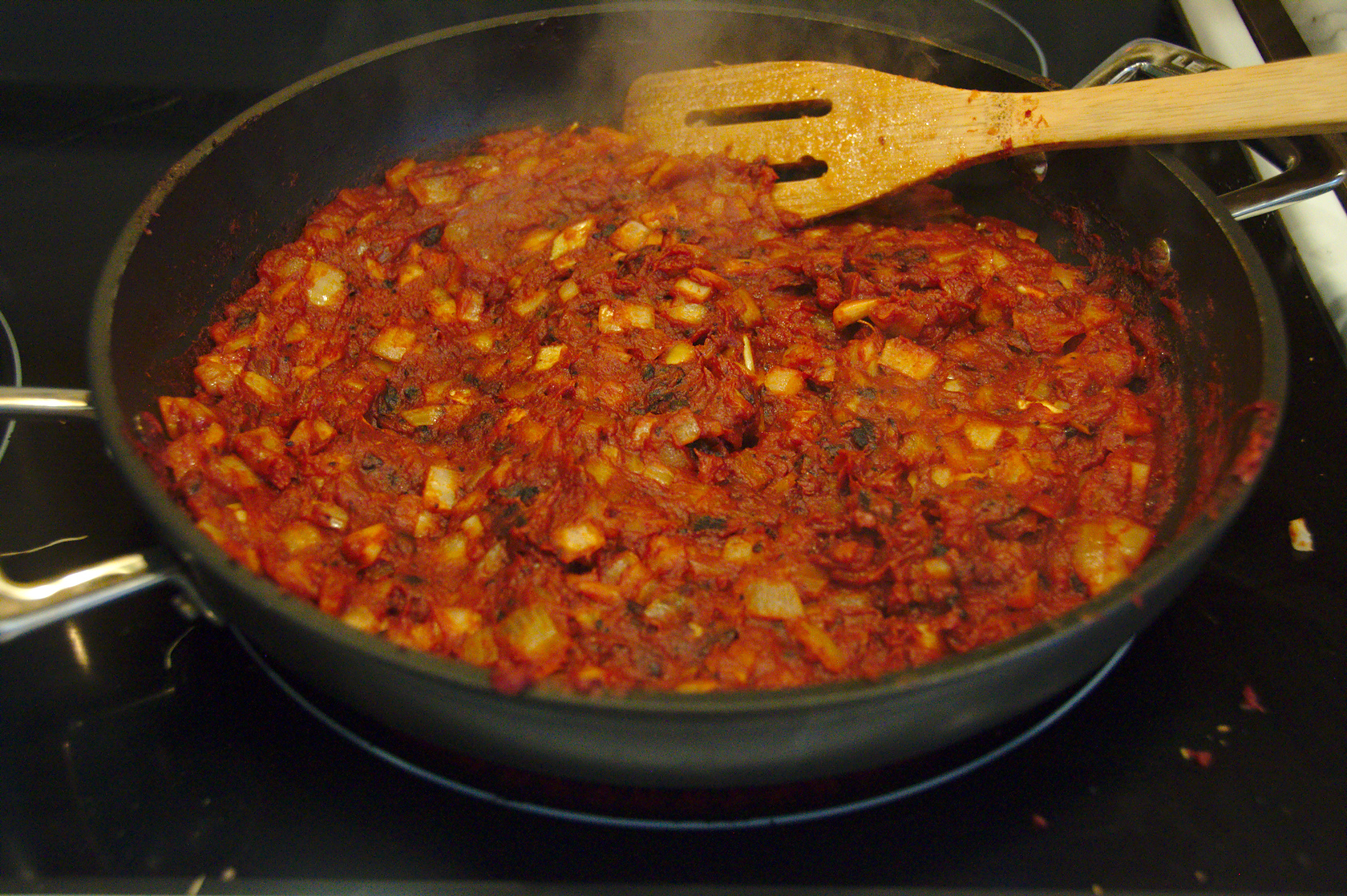 Browned tomato paste with onions in